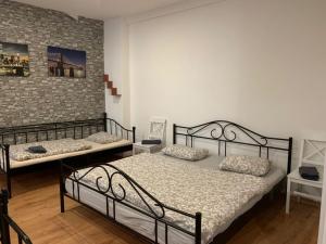 Postel nebo postele na pokoji v ubytování Teplice Central Park