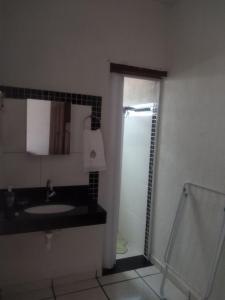 Kúpeľňa v ubytovaní Suítes Ponta do Sol (Trator)