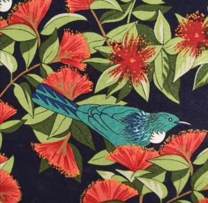 a blue bird is sitting on a floral pattern at Grampians B&B in Nelson