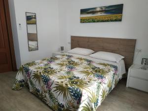 Postel nebo postele na pokoji v ubytování un passo dal mare