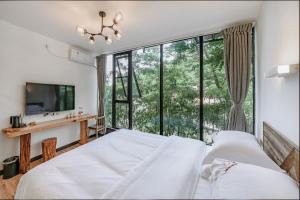 昆明市にあるJiannanshan Garden Homestayのギャラリーの写真