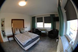 Postel nebo postele na pokoji v ubytování Gästehaus Kleinfurra