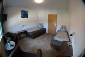 Postel nebo postele na pokoji v ubytování Gästehaus Kleinfurra