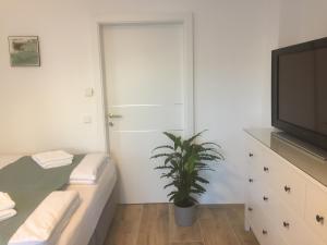 Postel nebo postele na pokoji v ubytování Gästewohnung Schlossblick