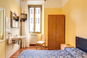 Postel nebo postele na pokoji v ubytování Hotel Romagna + 37 fotografií