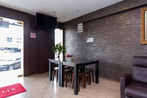 Posezení v ubytování I Harmony Hotel