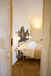 Voodi või voodid majutusasutuse B&B Attico Taranto toas