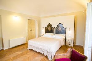 מיטה או מיטות בחדר ב-B&B Attico Taranto