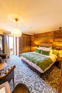 Ліжко або ліжка в номері Hotel Le V de Vaujany