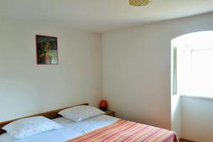 Postel nebo postele na pokoji v ubytování Vacation home Marinići