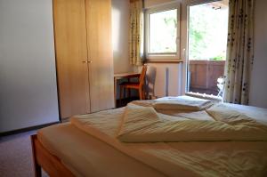 Posteľ alebo postele v izbe v ubytovaní Haus Hofer