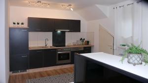 Kuchyň nebo kuchyňský kout v ubytování Ferienwohnung Philipp
