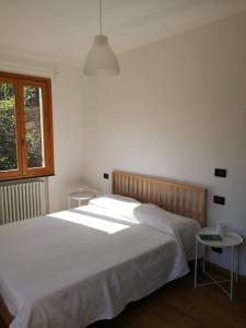 Krevet ili kreveti u jedinici u objektu Villa Olivari - apt la Salvia