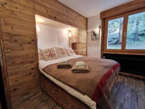 Tempat tidur dalam kamar di Verbier Medran