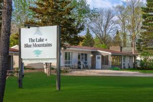 a sign in front of a blue mountains home at Boutique Suite #5 in Blue Mountains +5 photos