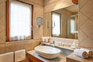Vannituba majutusasutuses Hotel Al Sonnenhof