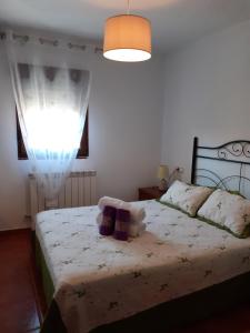 Postel nebo postele na pokoji v ubytování Castillo Alto
