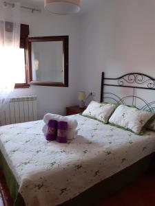 Postel nebo postele na pokoji v ubytování Castillo Alto