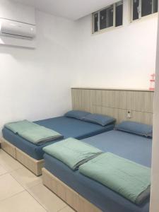 Postel nebo postele na pokoji v ubytování 一九六民宿