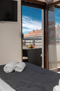 Postel nebo postele na pokoji v ubytování Apartman Gulin