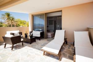 Predel za sedenje v nastanitvi Sea Shell Beach Suite