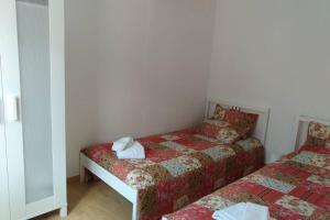 a room with two beds in a room at Casas da Nazaré2 in Ponte de Lima