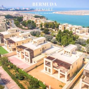 a large building with a view of the ocean at Holiday Home 3 bedroom Seaview in Ras al Khaimah