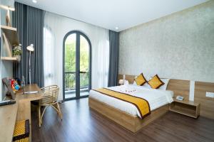 Postel nebo postele na pokoji v ubytování Sline Hotel