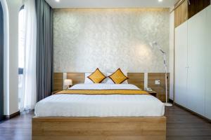 Postel nebo postele na pokoji v ubytování Sline Hotel
