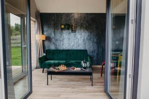 Posedenie v ubytovaní Sarnia Łąka Domek 1 z Prywatnym Jacuzzi