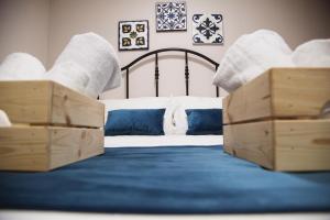 Кровать или кровати в номере Bottega Orafa Guest House