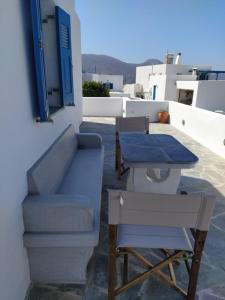 A seating area at Cycladic houses in rural surrounding