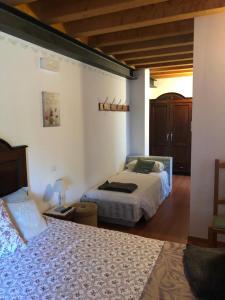 Ein Bett oder Betten in einem Zimmer der Unterkunft Agriturismo Antica Corte Contadina