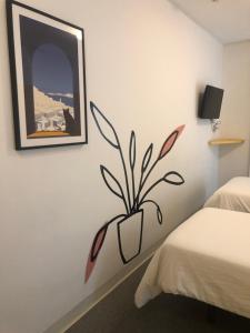 Posteľ alebo postele v izbe v ubytovaní Hostal Albany