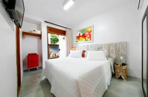 Cama ou camas em um quarto em Pousada Villa Maeva Itacare