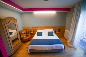 Postel nebo postele na pokoji v ubytování The Lion's Den BnB