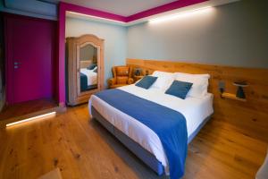 Postel nebo postele na pokoji v ubytování The Lion's Den BnB