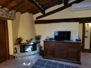 TV a/nebo společenská místnost v ubytování Casina nel Borgo