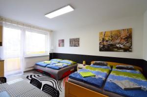 Posteľ alebo postele v izbe v ubytovaní Apartman Veronika