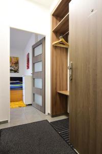 Posteľ alebo postele v izbe v ubytovaní Apartman Veronika