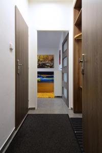 Posteľ alebo postele v izbe v ubytovaní Apartman Veronika
