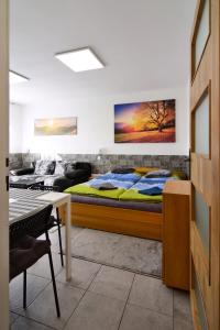 Postel nebo postele na pokoji v ubytování Apartman Nikola Trojanovice