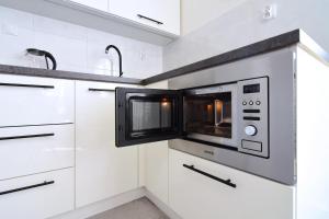 Kuchyň nebo kuchyňský kout v ubytování Apartman Nikola Trojanovice