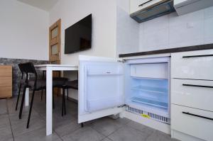 Kuchyň nebo kuchyňský kout v ubytování Apartman Nikola Trojanovice