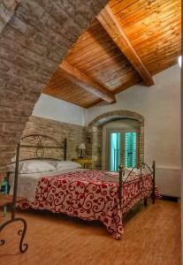 Residenza delle Grazie tesisinde bir odada yatak veya yataklar