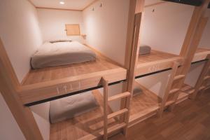 Ένα ή περισσότερα κρεβάτια σε δωμάτιο στο THY GUEST HOUSE