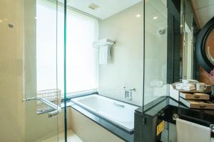 Koupelna v ubytování Shantou Junhua Haiyi Hotel + 37 fotografií
