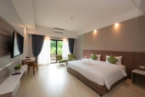 TV a/nebo společenská místnost v ubytování Phumontra Resort Nakhon Nayok