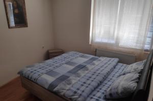 Ein Bett oder Betten in einem Zimmer der Unterkunft Allegro dream
