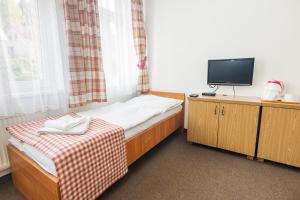 Posteľ alebo postele v izbe v ubytovaní Hotel Seifert